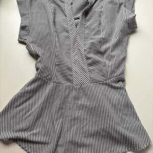 Monteau Los Angeles Gray and White Striped V-Neck Peplum Short Sleeve Blouse